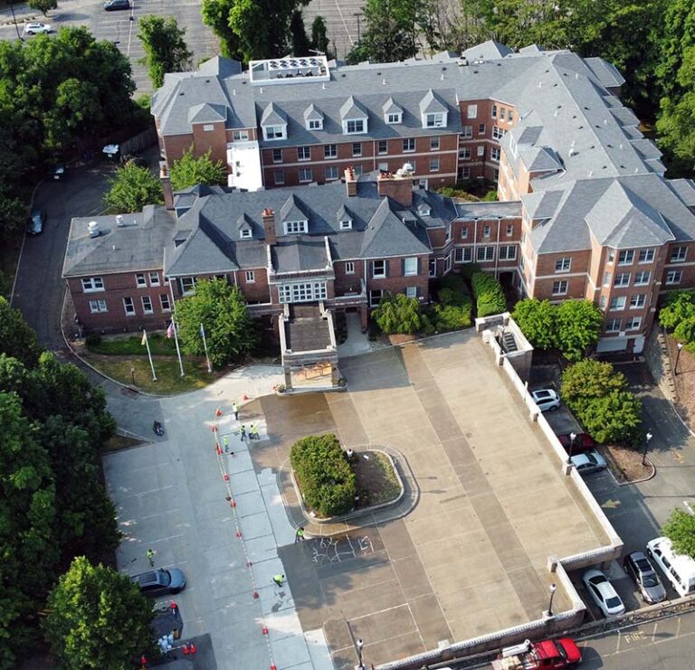 T.G. Basile restores concrete roof slabs, improving drainage and preserving structural safety for large institutional buildings