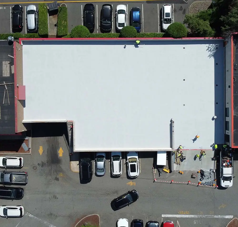T.G. Basile enhances commercial roof slabs with proper drainage to prevent pooling, leaks, and structural damage over time