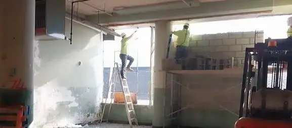 Basile crew works on structural wall repair and restoration during the Mack Truck Plant renovation in Plainfield, New Jersey